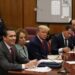 Former U.S. President Donald Trump appears in court with members of his legal team for an arraignment on charges stemming from his indictment by a Manhattan grand jury following a probe into hush money paid to porn star Stormy Daniels, in New York City, U.S., April 4, 2023. REUTERS/Andrew Kelly/Pool